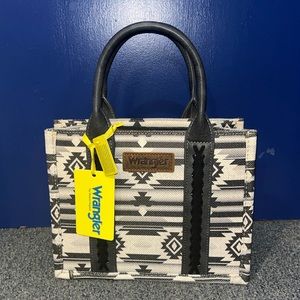Wrangler crossbody or hand held purse. Brand new, with tag.